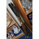 A SET OF NINE HAND FORGED VINTAGE GOLF CLUBS, hickory shafts, maker's names include Fred Collins, W.