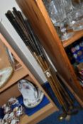 A SET OF NINE HAND FORGED VINTAGE GOLF CLUBS, hickory shafts, maker's names include Fred Collins, W.
