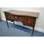 A 20TH CENTURY MAHOGANY SERPENTINE SIDEBOARD, with two cupboard doors flanking a single drawer, on
