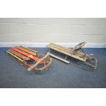 A VINTAGE WOODEN AND METAL SLEDGE, with steering and brakes, along with a vintage flyer sledge (
