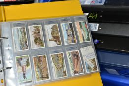 CIGARETTE CARDS, Six Albums containing approximately forty-five sets, part sets and 'odds'
