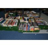 FIVE BOXES OF BOOKS, CDS AND DVDS, approximately ninety books to include a first edition of John