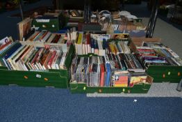 FIVE BOXES OF BOOKS, CDS AND DVDS, approximately ninety books to include a first edition of John