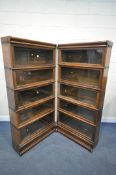 AN EARLY 20TH CENTURY GLOBE WERNICKE TWIN CORNER SECTIONAL BOOKCASE, comprising of ten glazed fall