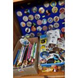 TWO TRAYS OF VINTAGE PIN BADGES AND A COLLECTION OF SOUVENIR PENCILS, comprising a painted metal