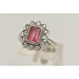 AN 18CT WHITE GOLD, PINK TOURMALINE AND DIAMOND CLUSTER RING, designed with a rectangular cut pink