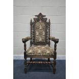 AN EARLY 20TH CENTURY CARVED OAK CAROLEAN ARMCHAIR, the top with twin mythical creatures, barley