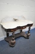 A VICTORIAN FLAME MAHOGANY DUCHESS WASHSTAND, the marble top with a raised back and shelf, on a