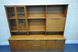 A MID CENTURY TEAK WALL DISPLAY CABINET, with an arrangement of shelving, cupboards and drawers,