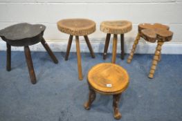 FIVE VARIOUS LIVE EDGE TOP TRIPLE LEGGED STOOLS (condition report: -one stool with rickety legs) (