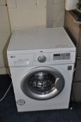 A LG INVERTER DIRECT DRIVE 7kg WASHING MACHINE width 60cm x depth 60cm x height 85cm (PAT pass,