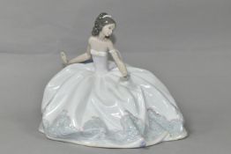A LLADRO 'AT THE BALL' FIGURINE, no 5859, depicting a seated lady in a ball gown holding a fan,