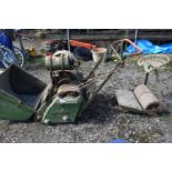 A DENNIS PETROL CYLINDER RIDE ON LAWN MOWER, with grass box and starting handle (engine moves freely