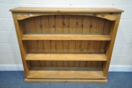 A MODERN LOW PINE OPEN BOOKCASE, with two fixed shelves, width 148cm x depth 32cm x height 124cm (