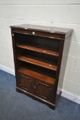 A MODERN MAHOGANY OPEN BOOKCASE, with two adjustable shelves, and double cupboard doors, width