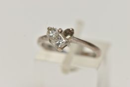 A 18CT WHITE GOLD DIAMOND RING, AF heart shape ring set with two diamonds (one missing), pinched