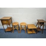 AN EARLY 20TH CENTURY OAK SEWING BOX, an oak table top revolving bookcase, an oak torchere stand,