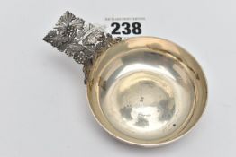 AN ELIZABETH II HECTOR MILLER SILVER WINE TASTER, planished bowl with cast and pierced fruiting vine