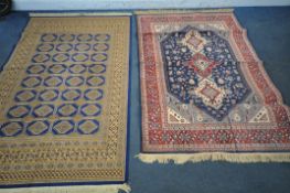 TWO LATE 20TH CENTURY SYNTHETIC SILK RUGS, 205cm x 135cm (condition report: -one rug creased where