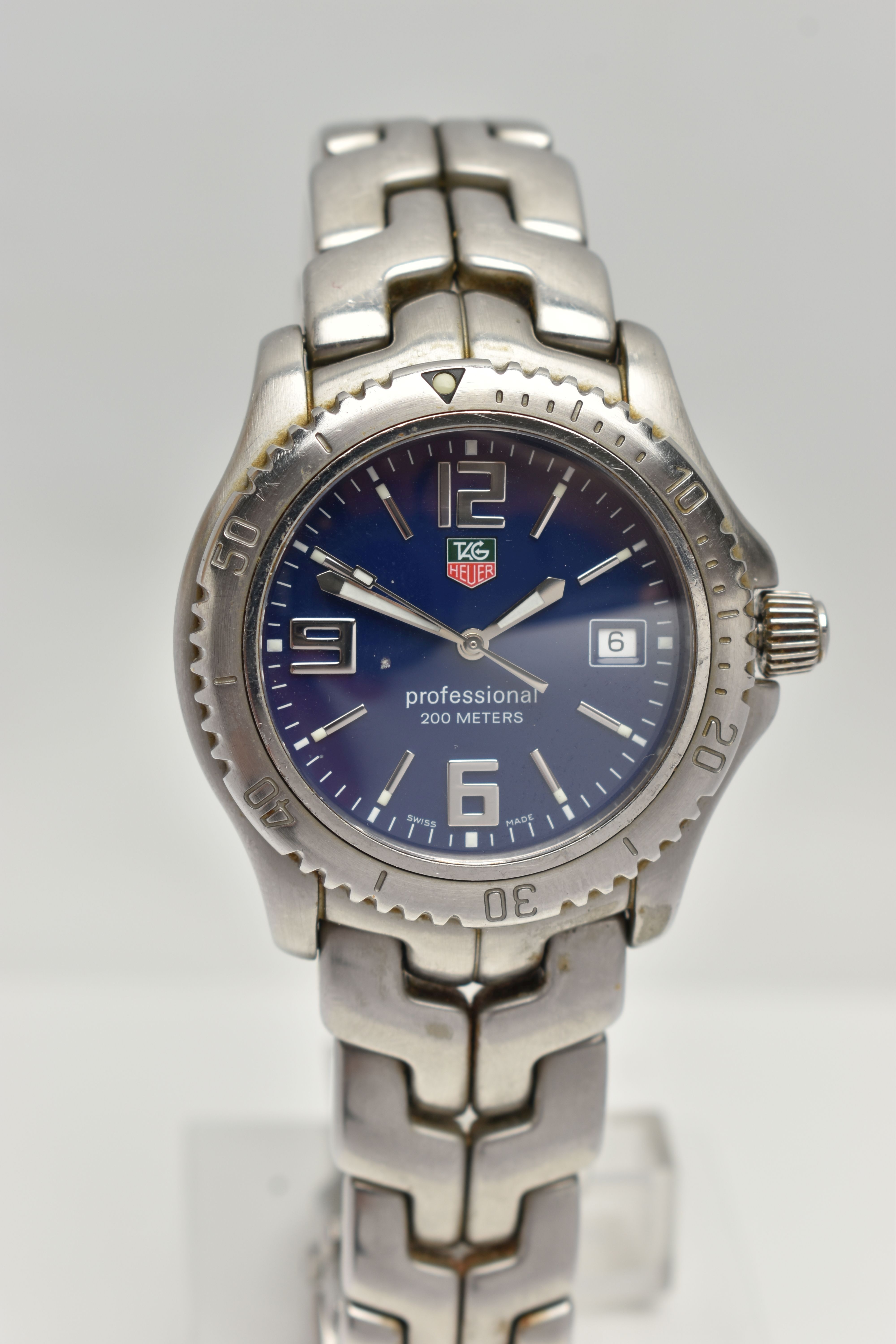 A TAG HEUER PROFFESSIONAL 200M WRISTWATCH, blue dial illuminous silver colour hourly applied