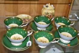 A GROUP OF AYNSLEY ORCHARD GOLD TEA AND GIFT WARES, comprising six teacups and saucers with speckled