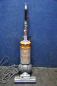 A DYSON DC41 VACUUM with one attachment (PAT Pass and Working)