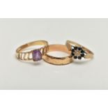 THREE 9CT GOLD RINGS, the first set with an oval amethyst and openwork shoulders, the second a