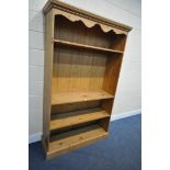 A MODERN PINE OPEN BOOKCASE, with three fixed shelves, width 124cm x depth 42cm x height 204cm (