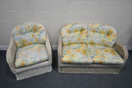 A WICKER TWO PIECE CONSERVATORY SUITE, to include a two seater settee and armchair, with loose