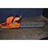 A CHARLES JACOBS 5800 VINTAGE PETROL CHAINSAW with 18in cut, and blade guard (engine pulls freely