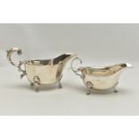 TWO GEORGE VI SILVER SAUCE BOATS, both with wavy rims, C scroll handles and on three cabriole legs