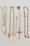 AN ASSORTMENT OF 9CT GOLD AND YELLOW METAL, to include a 9ct gold cross, , suspended from a yellow