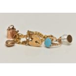 A 9CT GOLD CHARM BRACELET AND A TURQUIOSE RING, double link bracelet, fitted with three charms to