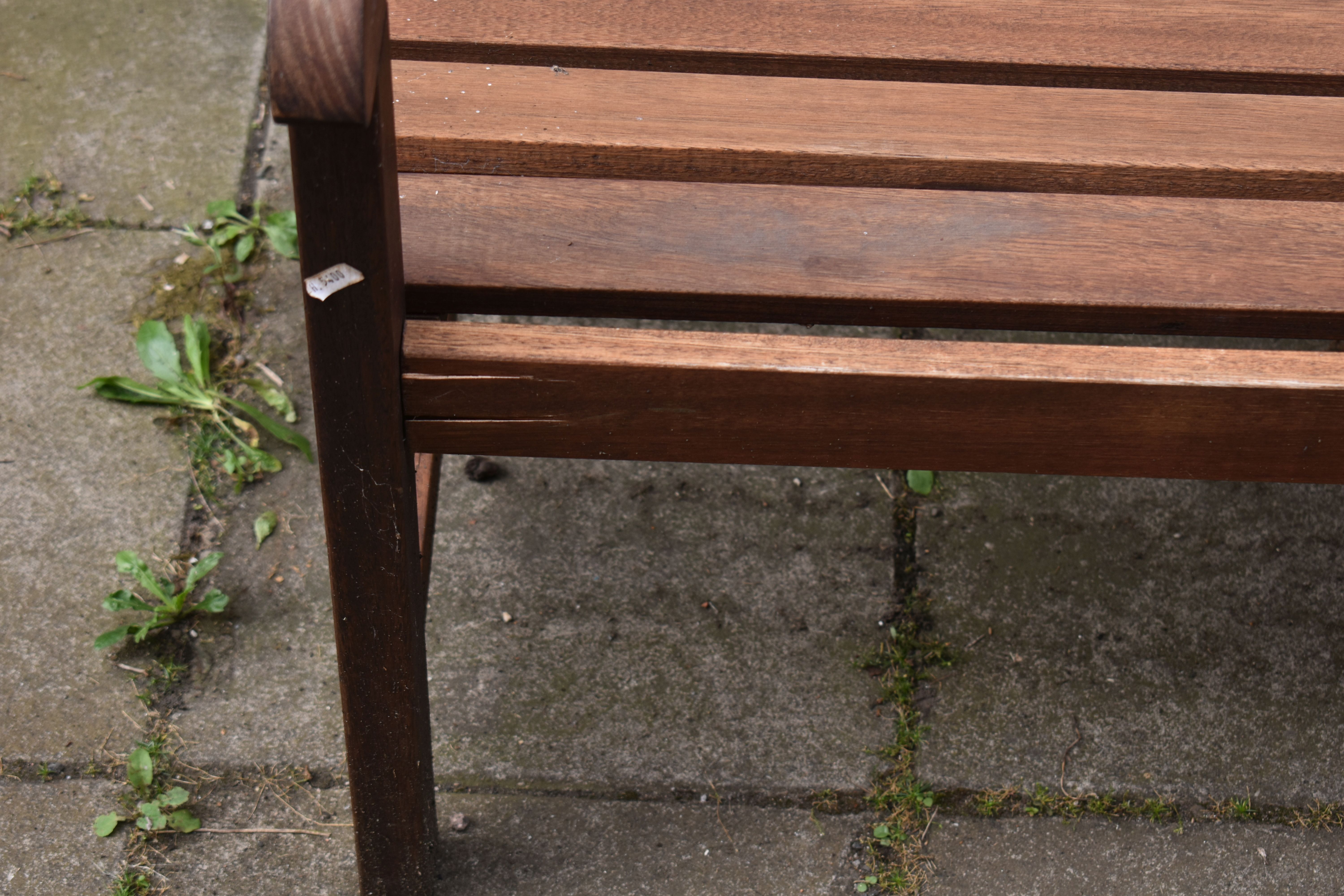 A STAINED TEAK SLATTED GARDEN BENCH, length 119cm, along with a two seater teak garden love seat/ - Image 3 of 4