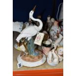 A GROUP OF FIGURINES, comprising a pair of Spanish Ceragan Crane figurines, four Bisque porcelain