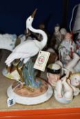 A GROUP OF FIGURINES, comprising a pair of Spanish Ceragan Crane figurines, four Bisque porcelain