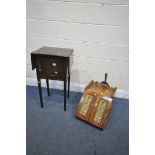 AN LATE VICTORIAN WALNUT TWO DOOR PURDONIUM, with pressed brass panels, and shovel, along with an