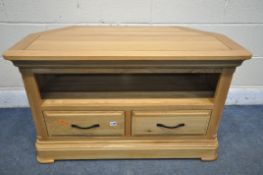 A LIGHT OAK CORNER TV STAND, with two drawers, width 102cm x depth 50cm x height 62cm (condition