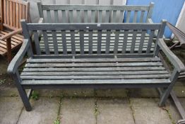 A PAIR OF PAINTED SLATTED GARDEN BENCHES, length 153cm (condition - both with paint loss, and