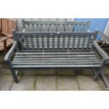 A PAIR OF PAINTED SLATTED GARDEN BENCHES, length 153cm (condition - both with paint loss, and