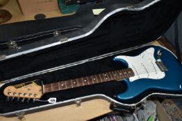 A 2000 USA FENDER STRATOCASTER GUITAR IN ORIGINAL HARDCASE finished in Aqua Flake paint, chrome