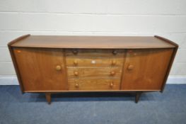 A MID-CENTURY JOHN HERBERT FOR YOUNGER LTD TEAK SIDEBOARD, with cupboard doors flanking four