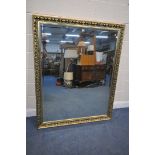 A LARGE GILT FRAMED BEVELLED EDGE WALL MIRROR, 154cm x 123cm (condition report: -good)