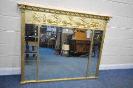 A REGENCY STYLE GILT FRAMED OVERMANTEL MIRROR, with a triple bevelled edge plate, 159cm x 128cm (