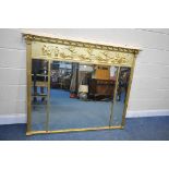 A REGENCY STYLE GILT FRAMED OVERMANTEL MIRROR, with a triple bevelled edge plate, 159cm x 128cm (