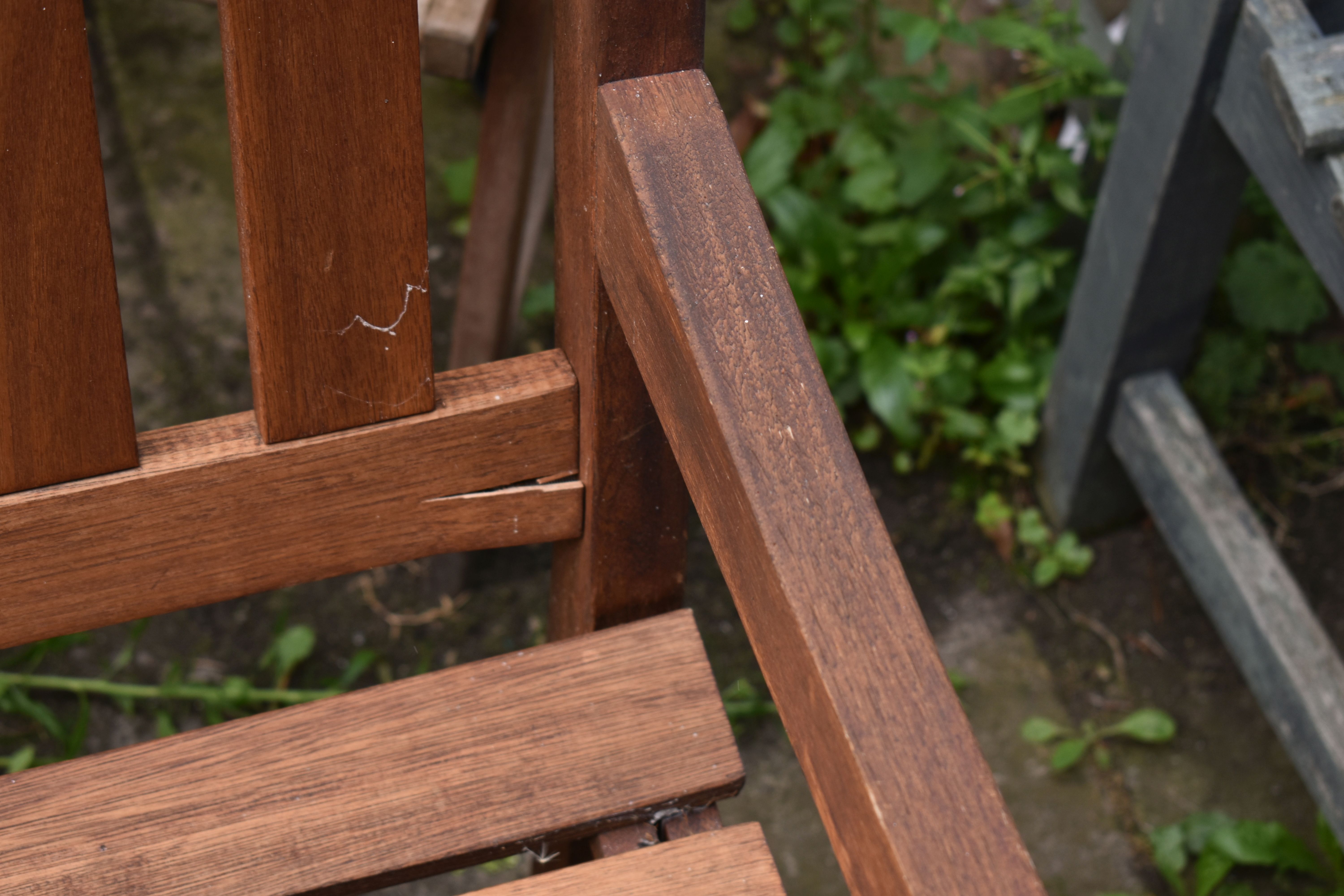 A STAINED TEAK SLATTED GARDEN BENCH, length 119cm, along with a two seater teak garden love seat/ - Image 2 of 4