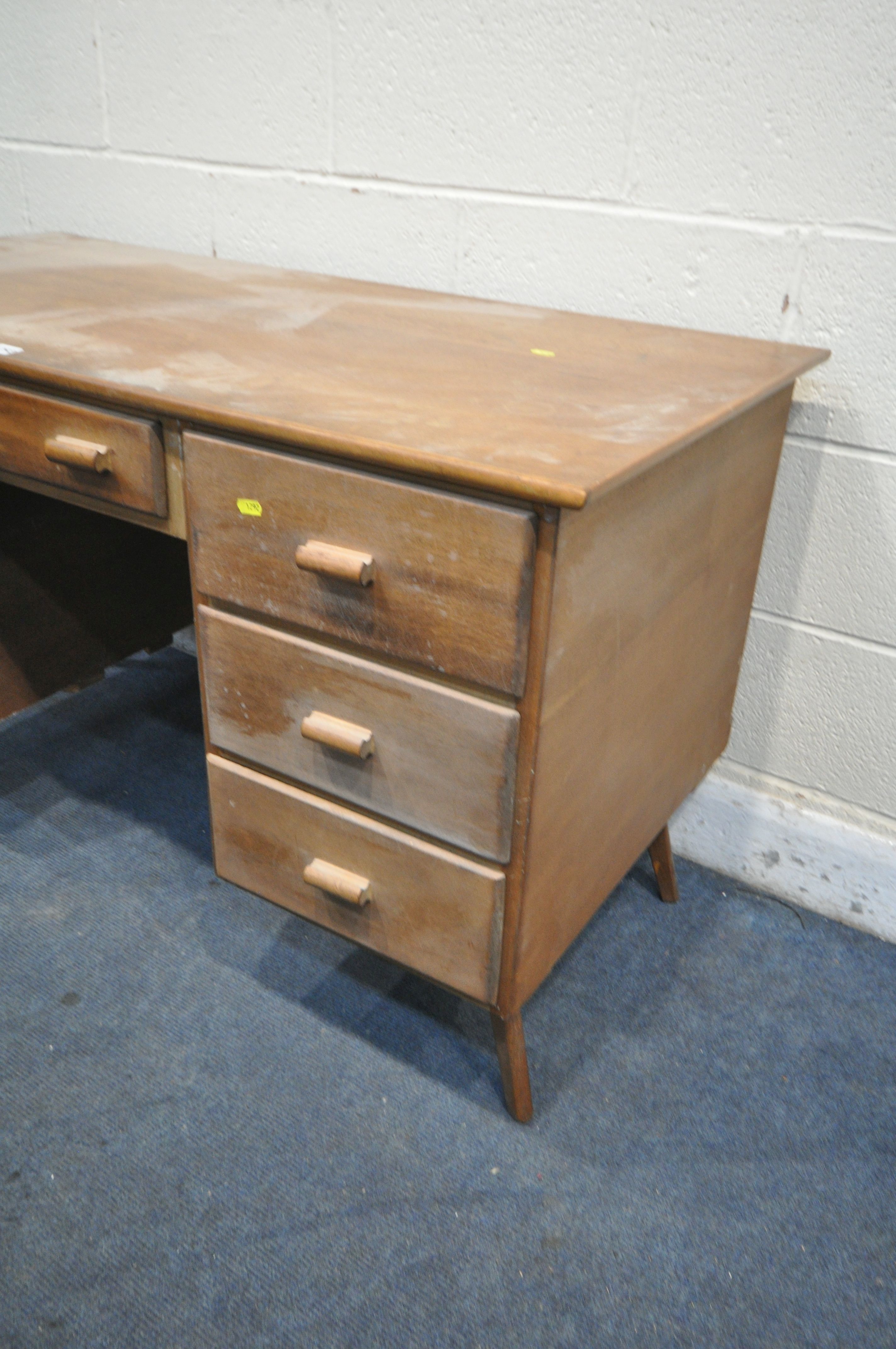 A MID CENTURY TEAK DESK, with seven drawers, width 124cm x depth 61cm x height 75cm (condition - Image 2 of 2