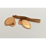 A CASED 9CT GOLD PAIR OF CUFFLINKS AND A TIE CLIP, Automotive Products Group Golden Jubilee case,