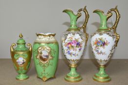 FOUR EARLY 20TH CENTURY COALPORT GREEN AND GILT GROUND EWERS AND VASES, comprising a pair of