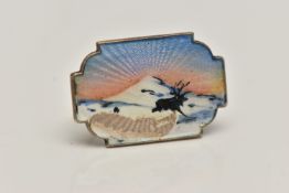 AN 'IVAR T HOLTH' BROOCH, a white metal brooch with guilloche enamel detail, depicting a mountain
